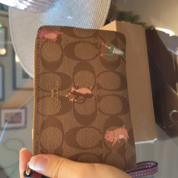 New with tags- small signature Coach wristlet - Picture 2 of 5